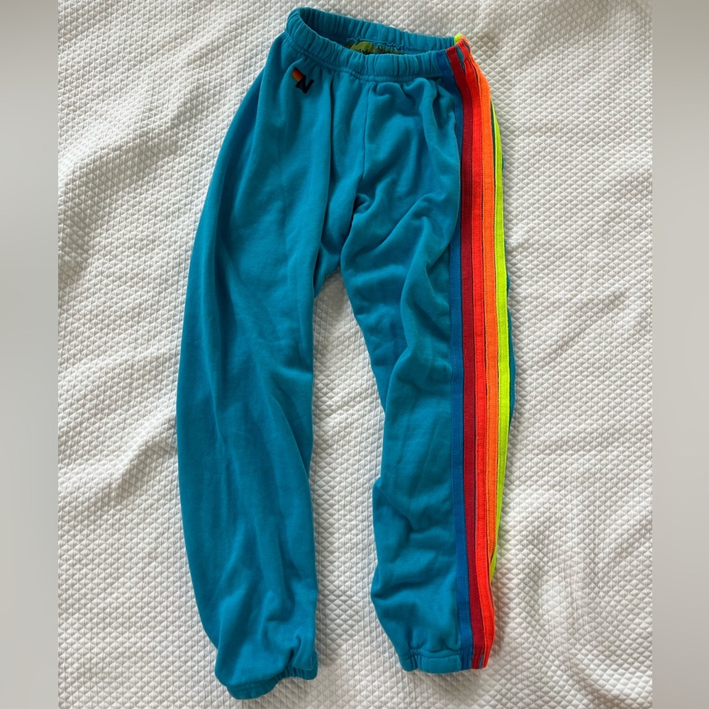 Aviator Nation Neon Blue Joggers with Rainbow Stripes